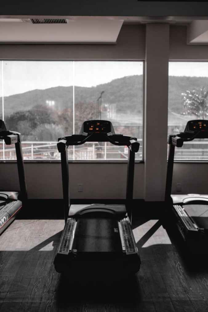 treadmill near glass window
